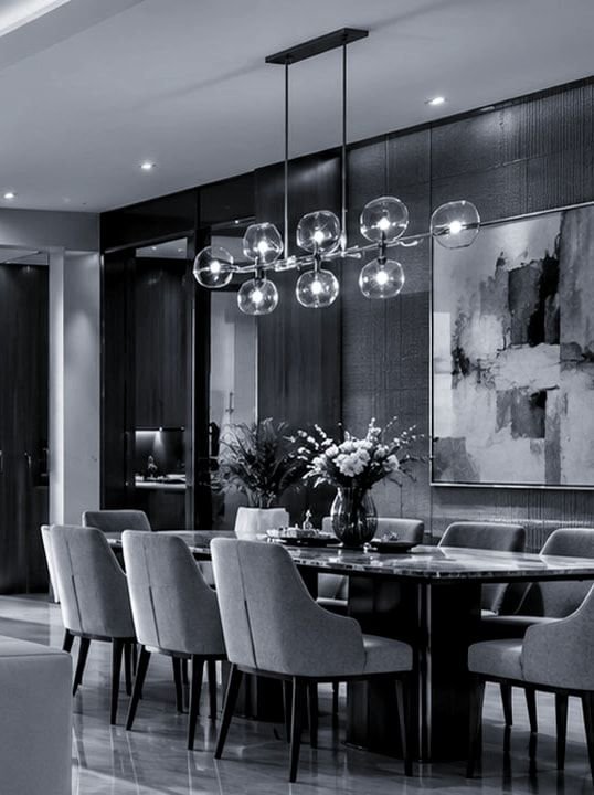 Conceptual dining area with a glass globe chandelier. Not the actual project.
