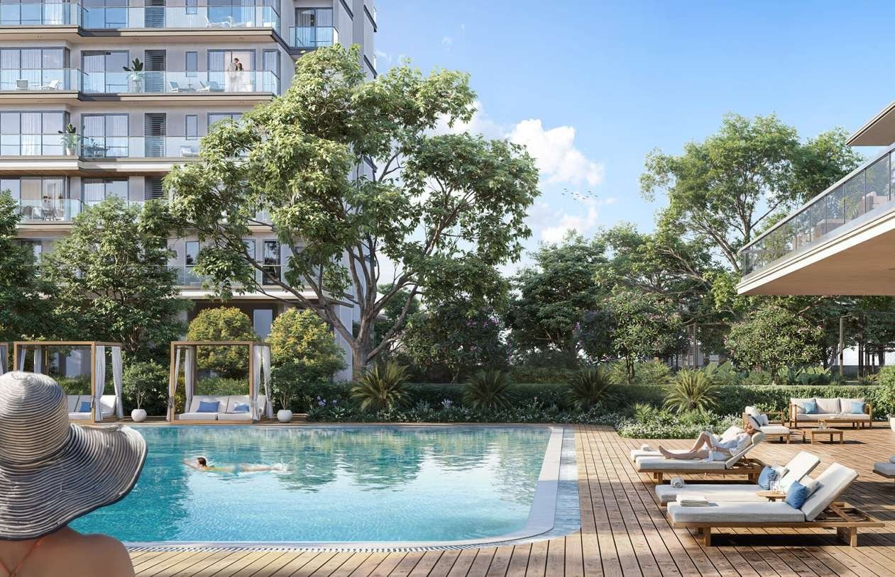Artist's impression of the resort-style pool deck with loungers beside the towers.